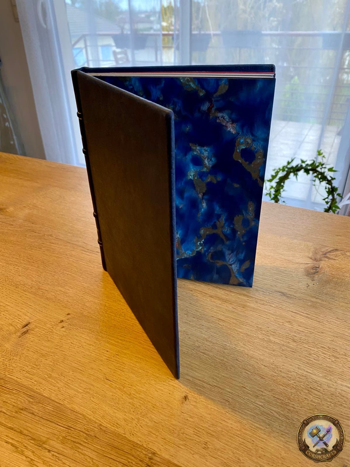 Reliure cuir L'Univers de Charles LIU